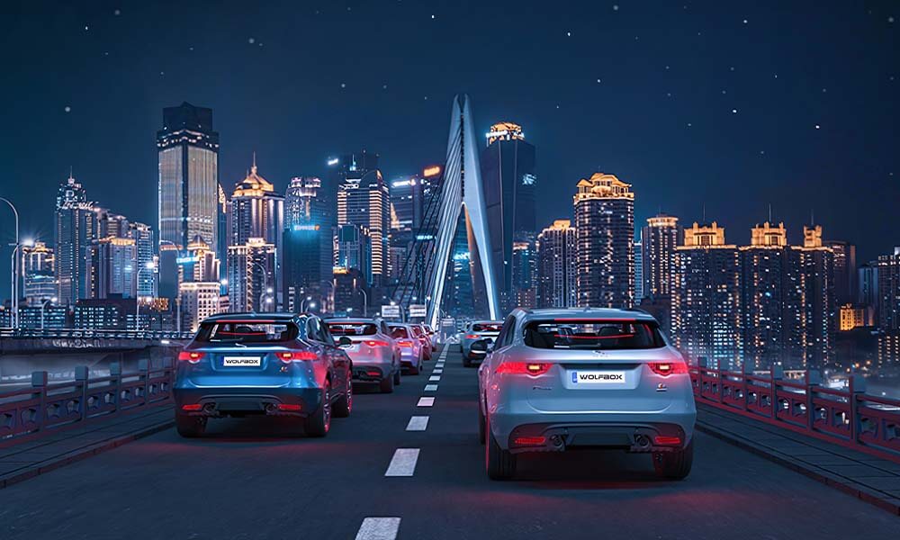 dash cam night vision footage of cars crossing city bridge with bright lights