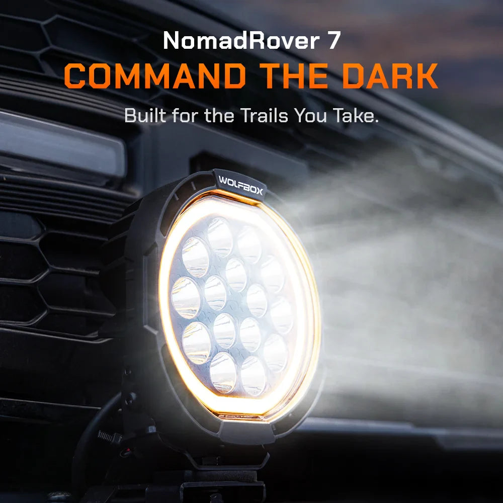 NomadRover 7-inch off-road LED pod light mounted on vehicle A-pillar at night