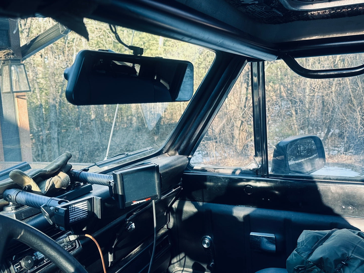 The Wolfbox dash cam is installed in the car.