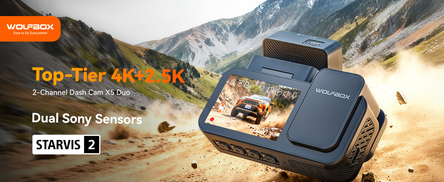 Wolfbox dual-channel dash cam with 4K and 2.5K resolution in a mountainous landscape.