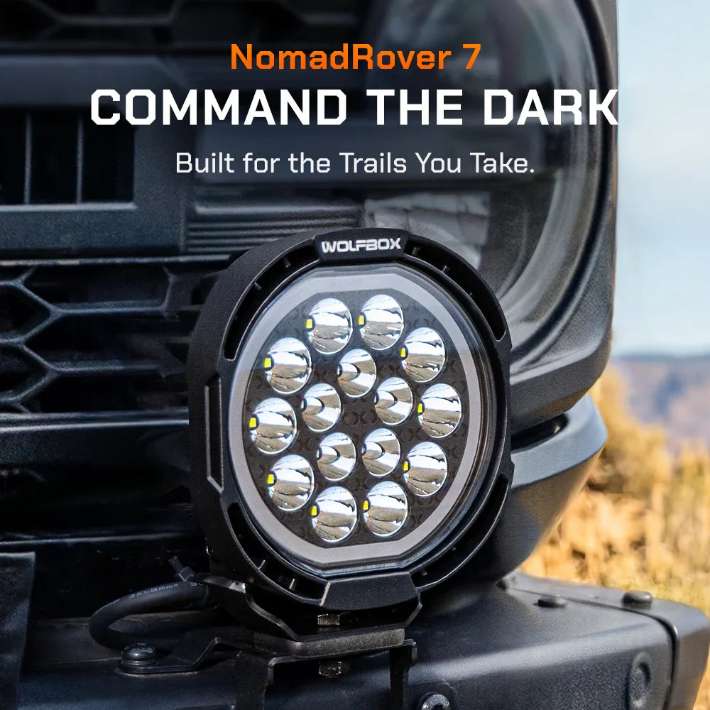 NomadRover 7-inch off-road LED pod light mounted on vehicle A-pillar at night
